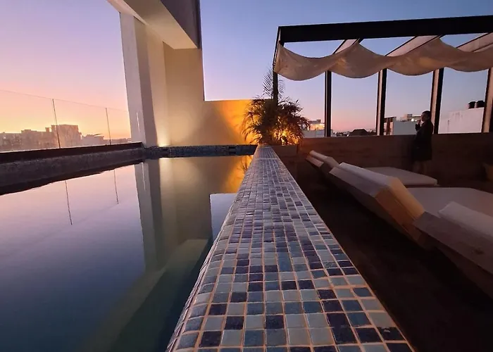 George Luxury * Playa del Carmen
